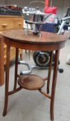 An Edwardian mahogany occasional table together with an electroplated kettle on stand