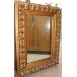 A gilt decorated wall mirror