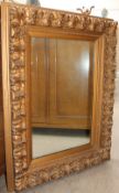 A gilt decorated wall mirror