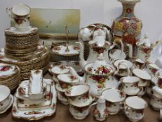 A Royal Albert Old Country Roses pattern part tea set together with a Japanese satsuma vase and an