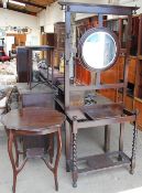 An oak hall stand with a central circular mirror together with an occasional table