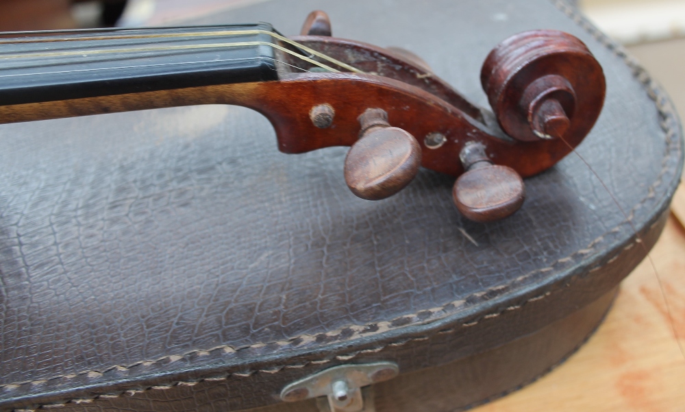 A violin with a two piece back and ebonised stringing, bears a label “Dulcis et Fortis”, - Image 3 of 4