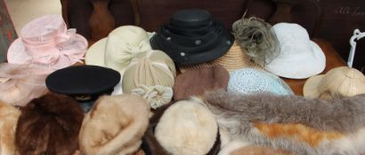 An Alison Tod fascinator together with a bowler hat, other hats,