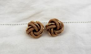 A pair of 9ct yellow gold knot earrings, approximately 4.