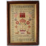 A Victorian woolwork sampler depicting a house, vase of flowers, angels,