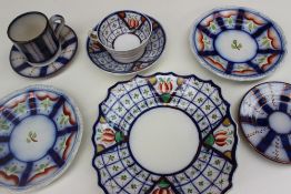 A Gaudy Welsh trellis pattern tea cup, saucer and bread and butter plate,