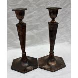 A pair of George VI silver candlesticks, of hexagonal tapering form on a spreading foot, Sheffield,