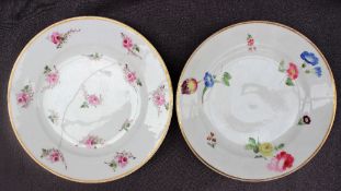 A Swansea porcelain plate with a gilt rim, painted with sprays of garden flowers,