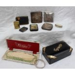 A George V silver gilt and ebony cigarette box, Sheffield, 1911,