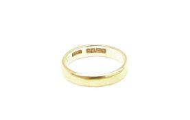 A 22ct yellow gold wedding band,