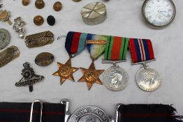 A set of four World War II medals including The 1939-1945 Star, The Atlantic Star,