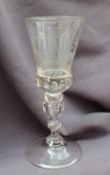 A 19th century Dutch East India Company wine glass, with a trumpet shaped bowl,