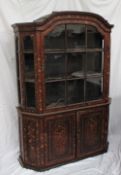 A Dutch walnut and marquetry decorated bookcase,