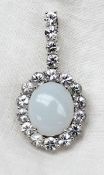 A white sapphire and opaline pendant,
