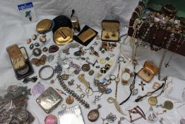 Assorted costume jewellery including a silver note case, silver cigarette case, silver locket,