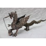 A Welsh Dragon table lighter the silver plated body of the dragon finely formed with wick in mouth,