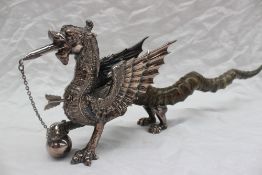 A Welsh Dragon table lighter the silver plated body of the dragon finely formed with wick in mouth,