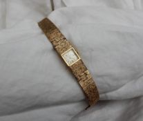 A Lady's 9ct yellow gold Bueche-Girod wristwatch,