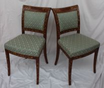 A pair of Dutch walnut and marquetry decorated dining chairs,