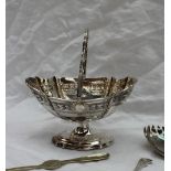 An Edward VII silver swing handled pedestal bowl,