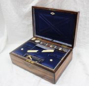A Victorian coromandel sewing box of rectangular form,