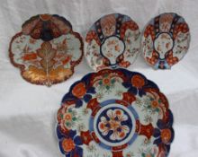 An Imari charger, with flowerheads and leaves with a royal blue and iron red border, 31.