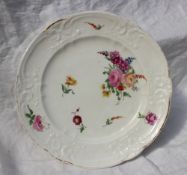 A pair of Nantgarw porcelain plates, with moulded C-scroll borders,