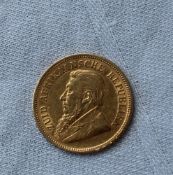 A 19th century South African 1/2 Pond gold coin,