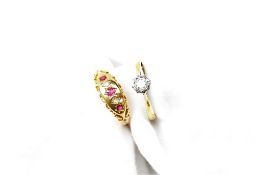 An 18ct yellow gold ruby and diamond gypsy ring together with a solitaire diamond ring to an 18ct