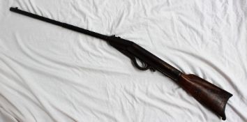 A GEM air rifle, with wooden stock and metal shoulder plate,