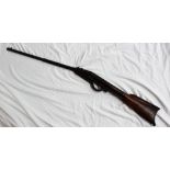 A GEM air rifle, with wooden stock and metal shoulder plate,