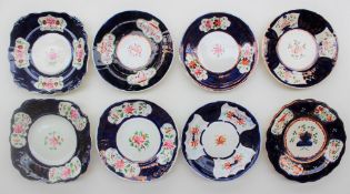A collection of Gaudy Welsh Side and bread and butter plates, various patterns including Cosmos,