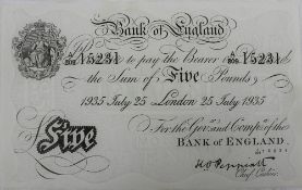 A Bank of England white Five Pounds note, "1935 July 25 London 25 July 1935" No. A209 15231, K.O.