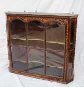 A Dutch walnut and marquetry decorated wall cabinet,