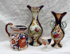 A Gaudy Welsh pottery twin handled vase together with another vase,