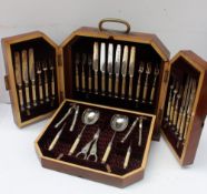 A late Victorian electroplated and ivory handled, silver collared fruit set,