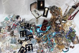 A large lot of costume jewellery, including necklaces,