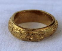 A Chinese yellow metal ring,