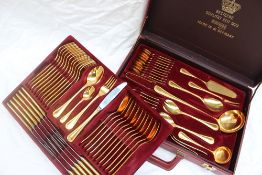 A Solingen gold plated flatware service, with a beaded edge and a place setting for twelve,