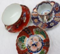 A Japanese porcelain tea cup and saucer together with an Imari tea bowl,