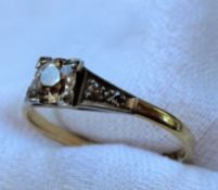 A solitaire diamond ring, the central old cut stone approximately 0.