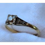 A solitaire diamond ring, the central old cut stone approximately 0.