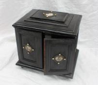 A 19th century ebonised table top cabinet,