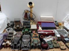 A Franklin Mint model of a Duesenberg Coupe Simone, together with other model and toy cars,