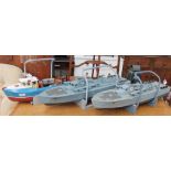 A pair of scratch built remote control military boats,