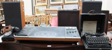 A Bang and Olufsen Beocenter 2002 record player and speakers (sold as seen, untested),