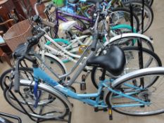 A Dawes Duchess Lady's bicycle together with a Saxon 105XS Lady's bicycle and an Apollo Metis