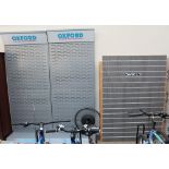 Two Oxford essential riders equipment display racks together with another display rack and a