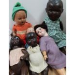 An Armand Marseille black doll, No.362 together with a small Armand Marseille doll No.