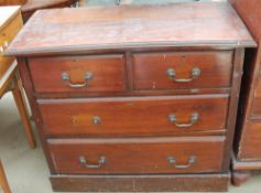 A 19th century mahogany chest with two short and two long drawers on a plinth